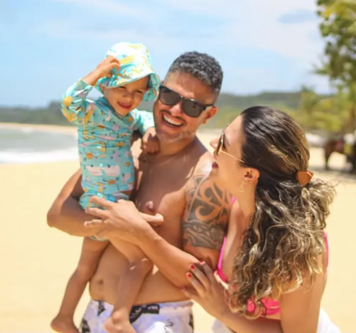 Karen, Adilson e Joaquim na praia